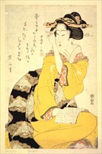 'A Geisha Reading a Book', 19th century. Artist: Kikukawa Eizan