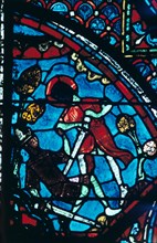Roland pierces the giant Ferragut in the navel, stained glass, Chartres Cathedral, 1194-1260. Artist: Unknown