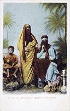 'Egyptian Women and Child', vintage French postcard, c1900. Artist: Unknown
