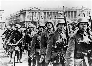 German troops marching through Paris, 17 June 1940. Artist: Unknown