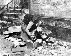 Woman scavenging for food, Bayreuth, Germany, April 1945. Artist: Unknown