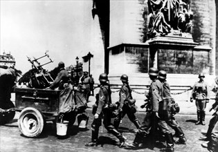 German troops marching past the Arc de Triomphe, Paris, June 1940. Artist: Unknown