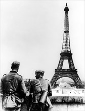 German soldiers at the Eiffel Tower, Paris, June 1940. Artist: Unknown