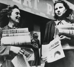 Women selling German newspapers, German-occupied Paris, 19 July 1940. Artist: Unknown