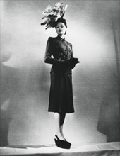 La femme chic, outfit by the French fashion designer Jacques Fath, Paris, January 1943. Artist: Unknown