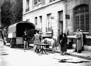 Delivery of furniture confiscated from Jews to victims of RAF bombing, Paris, April 1942. Artist: Unknown