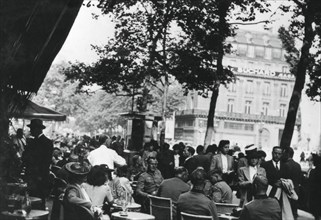 German army officers relaxing outside the Cafe de la Paix, Paris, June 1940. Artist: Unknown