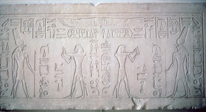 Lintel of Senusret III depicting the Pharaoh making offerings to the God Montu, 12th Dynasty. Artist: Unknown
