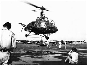 Helicopter landing at Tan Son Nhut Air Base, Saigon, Vietnam, 1953. Artist: Unknown