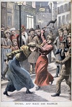 Two women fighting with sandbags, 1903. Artist: Unknown