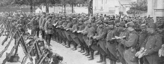 A colonel checking his soldiers' boots, Saint-Francois-Xavier, Paris, France, August 1914. Artist: Unknown
