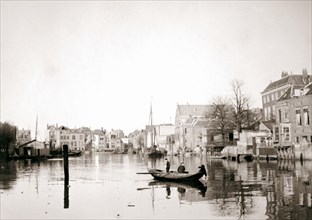Boat on the canal, Dordrecht, Netherlands, 1898.Artist: James Batkin