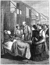 The queen visiting the wards of the London Hospital, late 19th century, (1900).Artist: G Durand