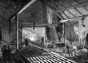 Running the molten iron into the pigs, c1880. Artist: Unknown