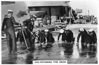 Holystoning the deck, HMS 'Nelson', 1937. Artist: Unknown