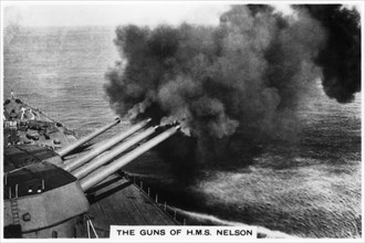 The guns of the battleship HMS 'Nelson' firing, 1937. Artist: Unknown