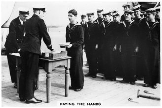 'Paying the hands', 1937. Artist: Unknown