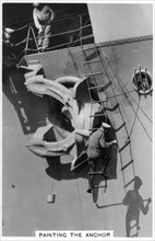 Painting the anchor of the aircraft carrier HMS 'Courageous', 1937. Artist: Unknown