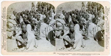 Boxer prisoners captured and brought in by the US 6th Cavalry, Tientsin, China, 1901.Artist: Underwood & Underwood