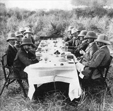 King George V (1865-1936) having lunch after tiger hunting in Nepal, 1911 (1936). Artist: Unknown