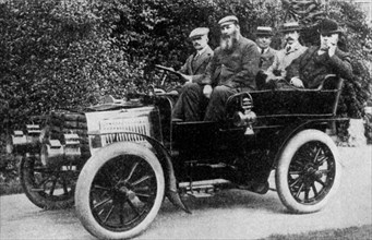 Five men sitting in a motor car, 1902 (1935). Artist: Unknown