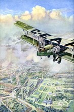 An aeroplane over London, 1926.Artist: GH Davis