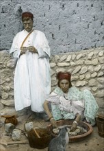 Mohamed Ben Ali and his wife, El Kantara, Tunisia. Artist: Unknown