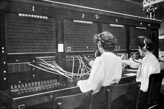 Switchboard operators at work, early 20th century. Artist: Unknown