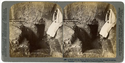 A tomb with the entrance stone rolled away, Jerusalem, 1901. Artist: Underwood & Underwood