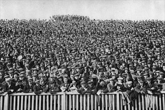 A Saturday winter football crowd, London, 1926-1927. Artist: Unknown