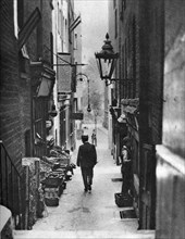 George Court (an alleyway leading to the Adelphi Theatre from the Strand), London, 1926-1927.Artist: Whiffin