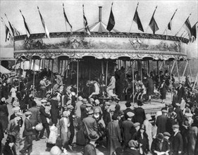 A merry-go-round, part of a bank holiday carnival on Hamstead Heath, London, 1926-1927. Artist: Unknown