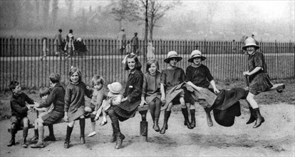 Children in a park, London, 1926-1927. Artist: Unknown