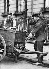 A gas fitter, London, 1926-1927.Artist: McLeish