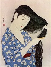 A Japanese woman combing her hair, 1920 (1930).Artist: Hashiguchi Goyo
