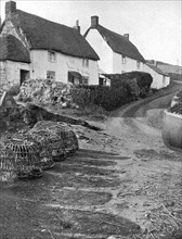Thatched cottages in Cadgwith, Cornwall, 1924-1926. Artist: Underwood