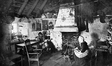 Interior of a crofter's cottage, Shetland, Scotland, 1924-1926.Artist: Valentine & Sons Ltd