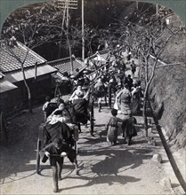 Riding to Daijingu Temple, for Shinto festival of worship of the Sun Goddess, Yokohama, Japan, 1904.Artist: Underwood & Underwood