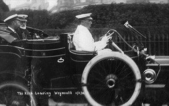King George V leaving Weymouth, Dorset, by car, 11th March 1912. Artist: Unknown