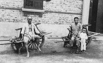 Men with wheelbarrows, Vietnam(?), 20th century. Artist: Unknown