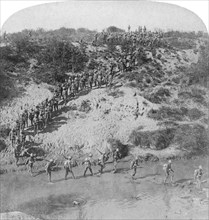 Infantry fording the Vet River during Lord Roberts' advance on Pretoria, South Africa, 1901.Artist: Underwood & Underwood