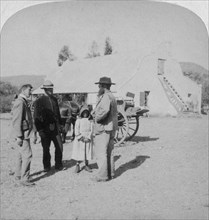 Intervewing a Boer farmer at his home near Brandfort, South Africa, Boer War, 1901.Artist: Underwood & Underwood