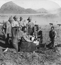 Making gas for one of the war balloons at Slingersfontein, South Africa, Boer War, 1900.Artist: Underwood & Underwood