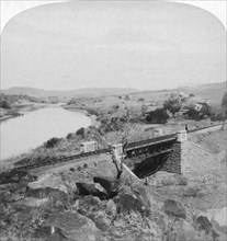 Pom-pom bridge and Boer headquarters telegraph station, Tugela River, Natal, South Africa, 1901.Artist: Underwood & Underwood
