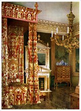 Queen Anne's bed, chest of drawers upon a stand and a wooden candelabra, 1910.Artist: Edwin Foley