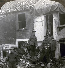 Destruction wrought by German Zeppelin bombs, World War I, 1914-1918.Artist: Realistic Travels Publishers