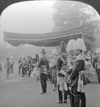 The King presenting Coronation medals, Buckingham Palace, London.Artist: Excelsior Stereoscopic Tours