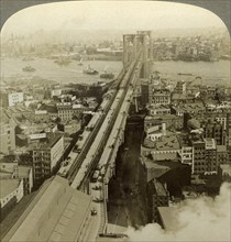 Brooklyn Bridge, New York, USA.Artist: Underwood & Underwood