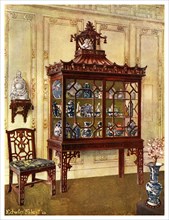 Carved china case in Chippendale's Chinese manner, 1911-1912.Artist: Edwin Foley