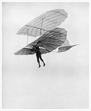 Otto Lilienthal makes one of his last flights, 1896 (1956). Artist: Unknown